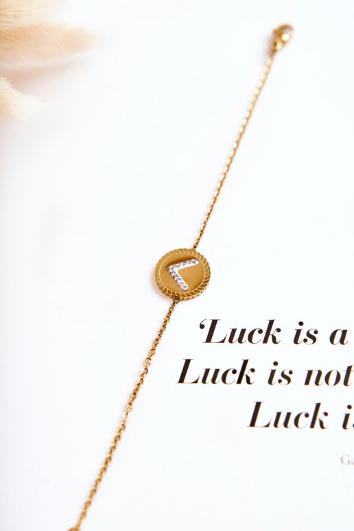 Moteriška apyrankė su ornamentais ir cirkonio akutėmis aukso spalvos