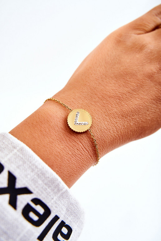 Moteriška apyrankė su ornamentais ir cirkonio akutėmis aukso spalvos