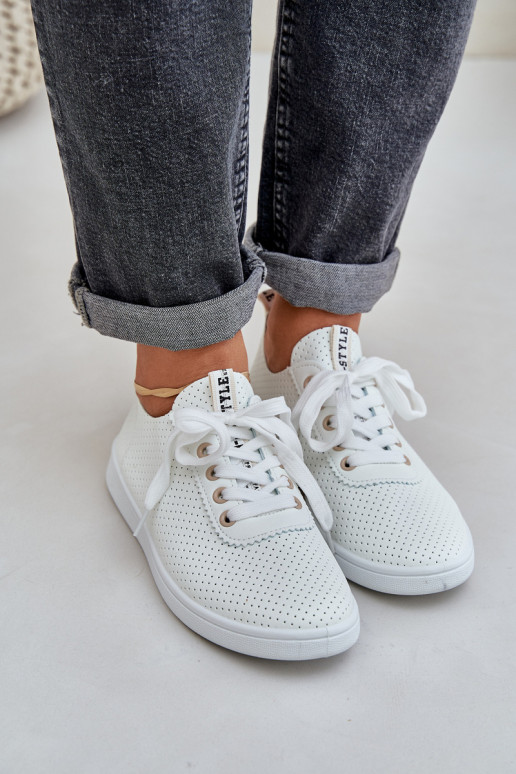 Suvarstomi ažūriniai laisvalaikio bateliai dramblio kaulo spalvos Carinel