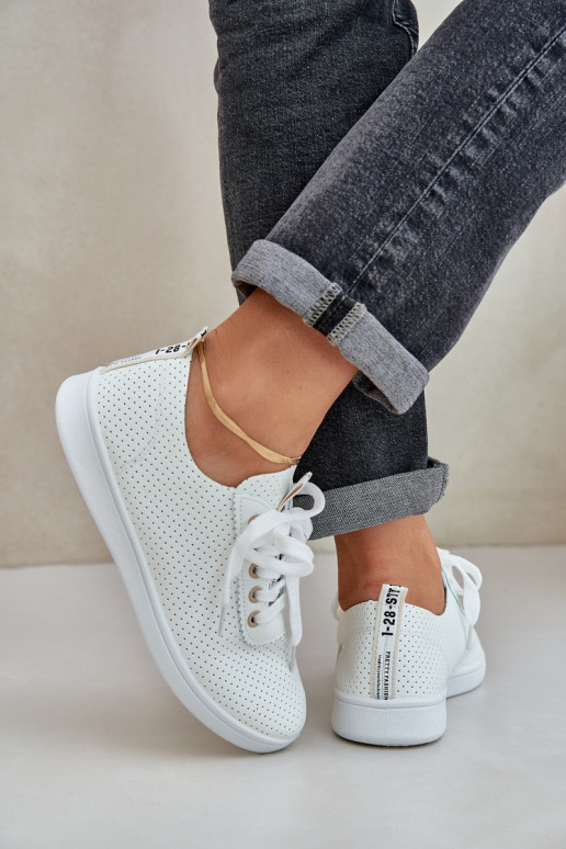 Suvarstomi ažūriniai laisvalaikio bateliai dramblio kaulo spalvos Carinel