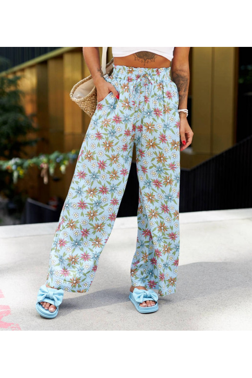 Vertemate mėlynos gėlėtos plačios kelnės