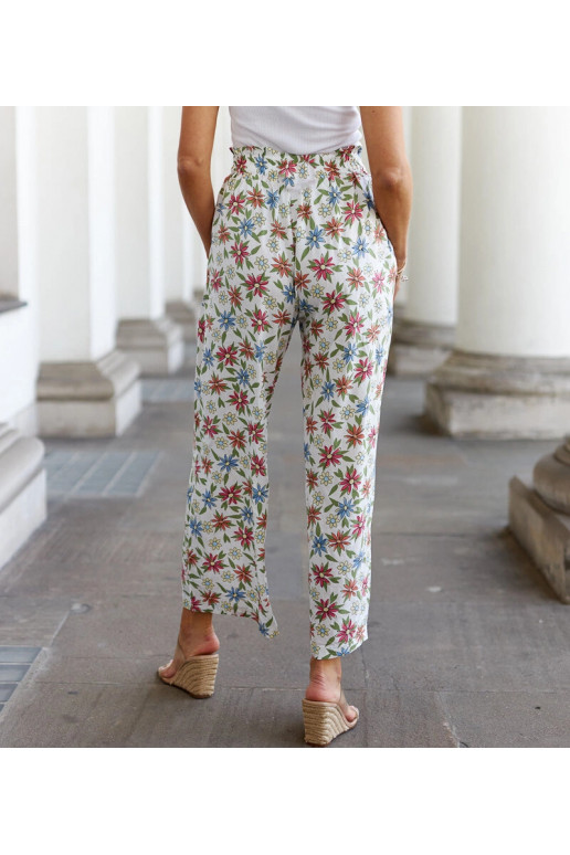 Baltos gėlėtos plačios kelnės Vertemate Baltos gėlėtos plačios kelnės Vertemate