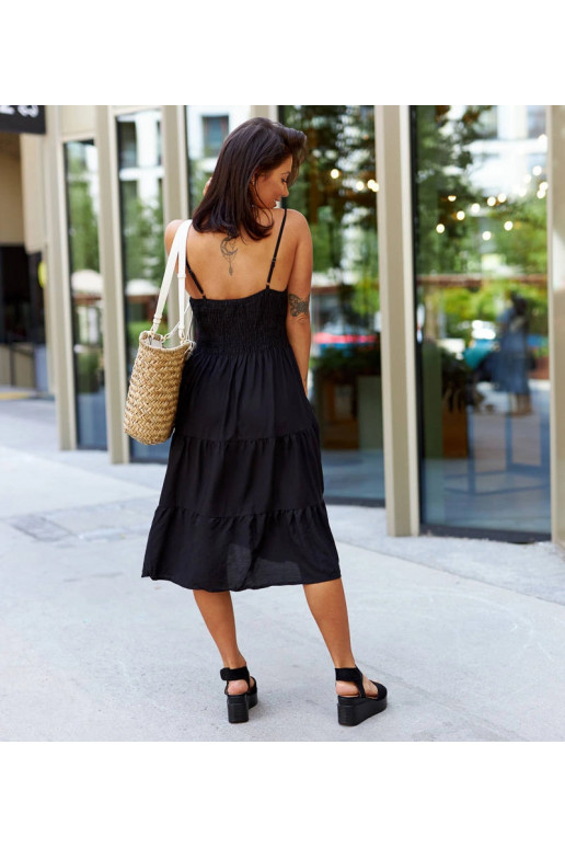 Juoda platėjanti suknelė Udinese Juoda platėjanti suknelė Udinese