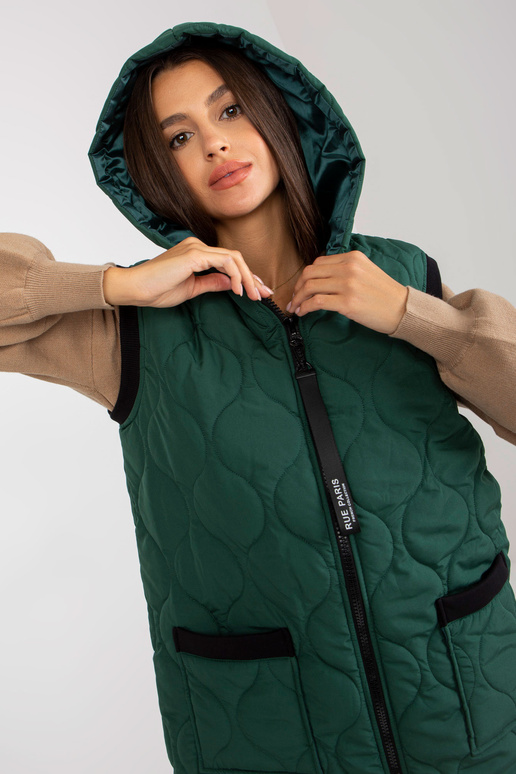 Tamsiai žalia ilga dygsniuota liemenė...