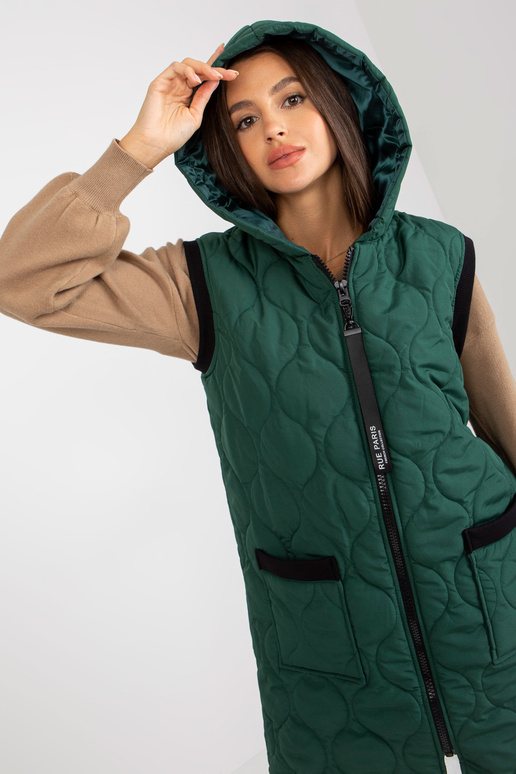 Tamsiai žalia ilga dygsniuota liemenė...