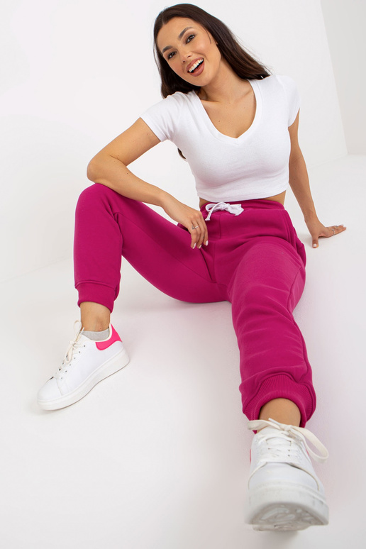 Fuchsiafarbene Jogginghose aus... Fuchsiafarbene Jogginghose aus...