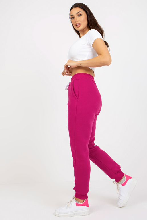 Fuchsiafarbene Jogginghose aus... Fuchsiafarbene Jogginghose aus...