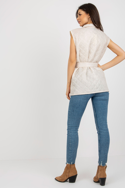 Šviesiai smėlio spalvos dygsniuota...