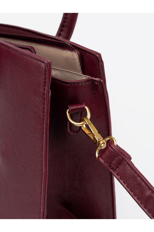 bordo spalvos rankinė  m kolorze