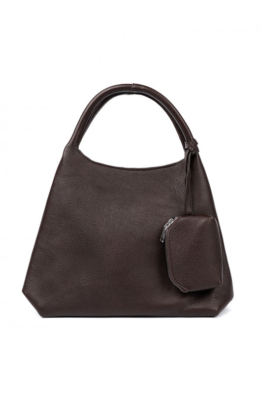   rankinė z kosmetyczką środku