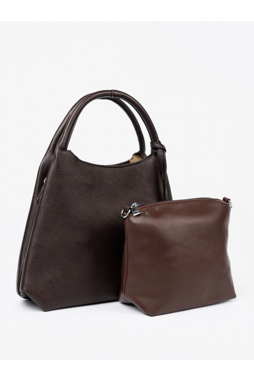   rankinė z kosmetyczką środku