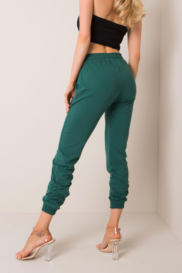 Tamsiai žalios kelnės Greičiau