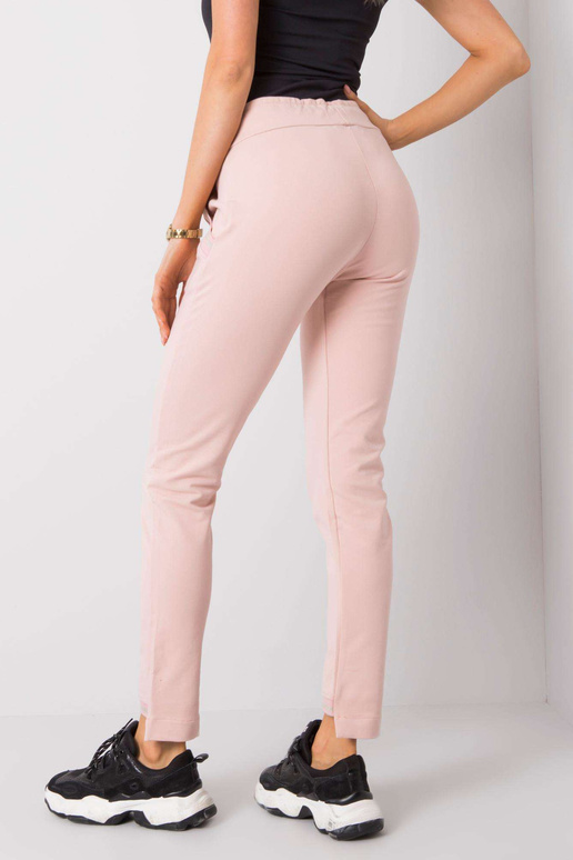 Pellone pudros rausvos sportinės kelnės