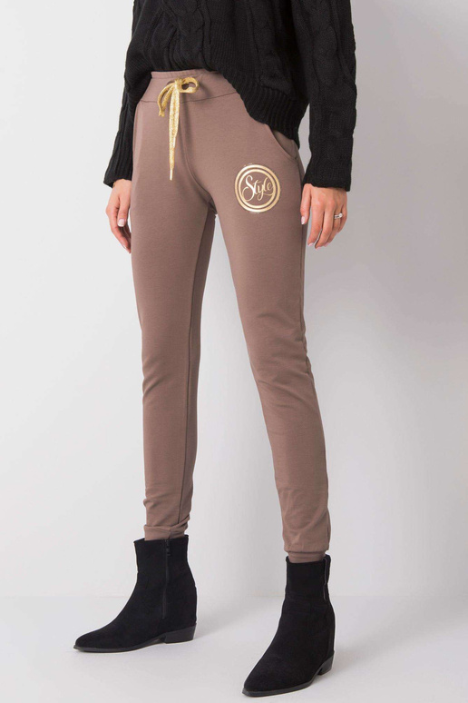 Šviesiai rudos sportinės kelnės...