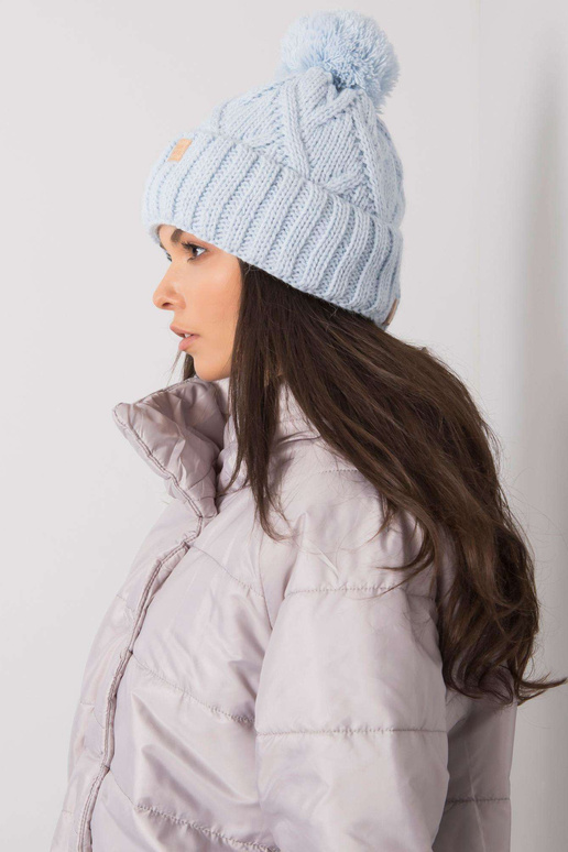 Šviesiai mėlyna žieminė kepurė su...