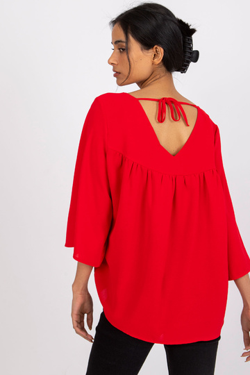 Raudona laisva palaidinė... 2