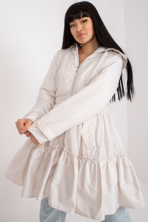 Šviesiai smėlio spalvos pūkinė... Šviesiai smėlio spalvos pūkinė...