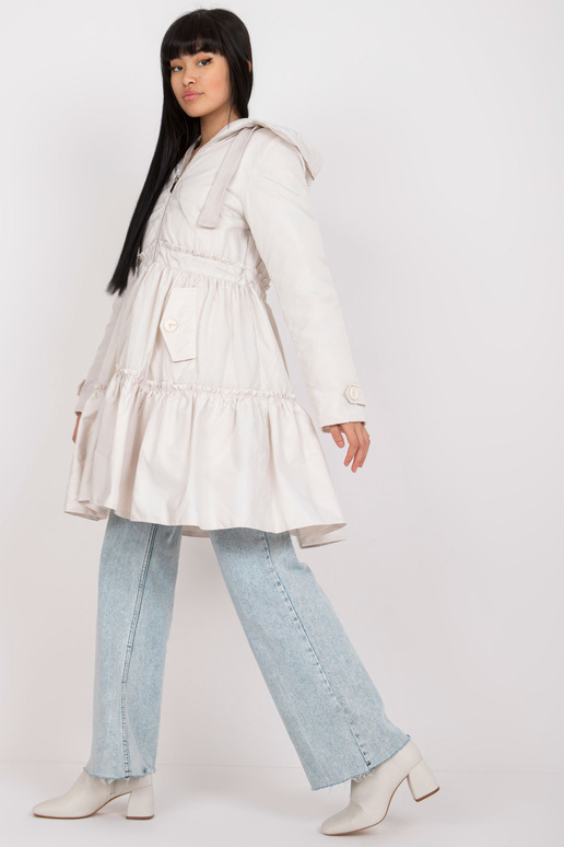 Šviesiai smėlio spalvos pūkinė... Šviesiai smėlio spalvos pūkinė...