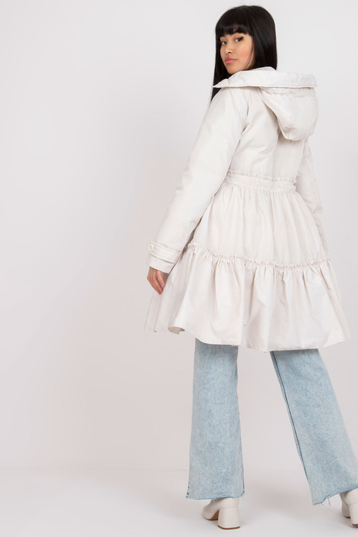 Šviesiai smėlio spalvos pūkinė... Šviesiai smėlio spalvos pūkinė...