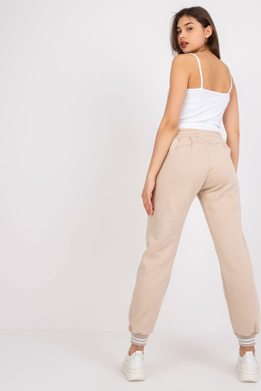 Smėlio spalvos sportinės kelnės...