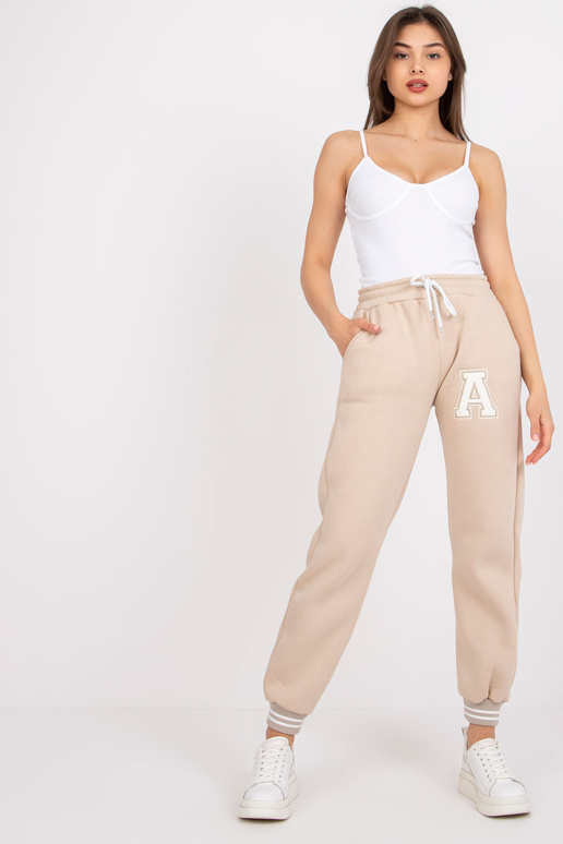 Smėlio spalvos sportinės kelnės...