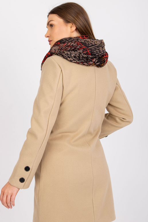 Smėlio ir oranžinės spalvos kaminas...