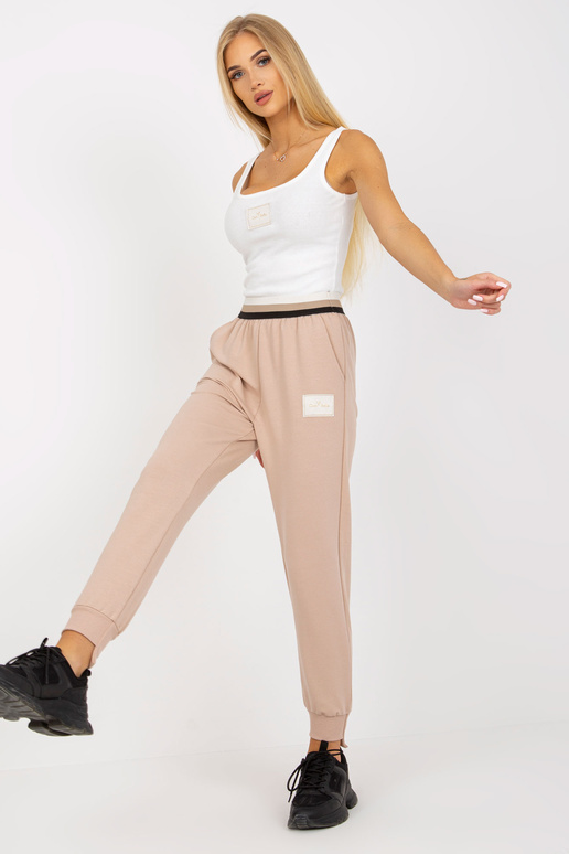 Smėlio spalvos sportinės kelnės...