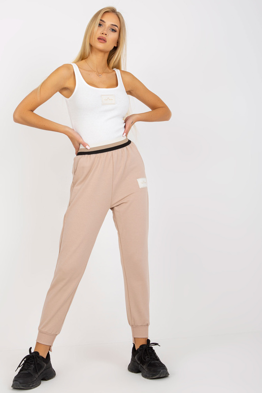Smėlio spalvos sportinės kelnės...