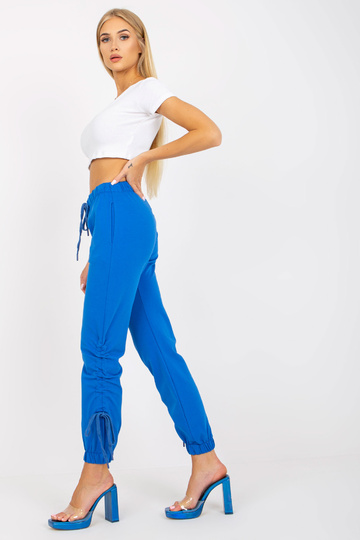 Mėlynos sportinės kelnės su...