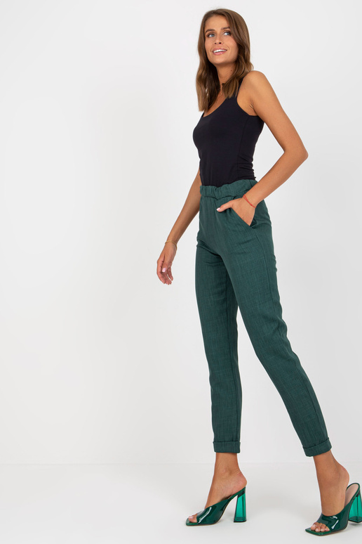 Tamsiai žalios elegantiškos kelnės iš...