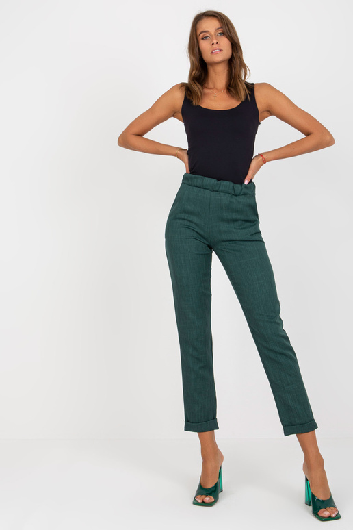 Tamsiai žalios elegantiškos kelnės iš...
