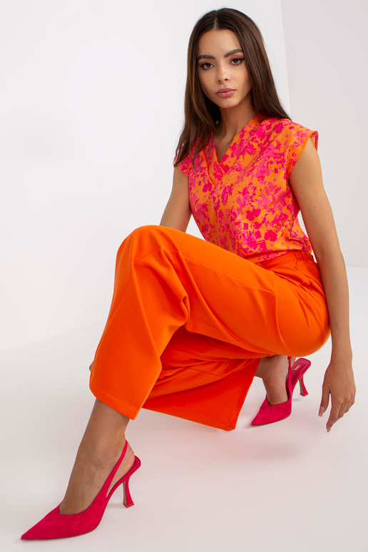 Oranžinės plataus audinio kelnės