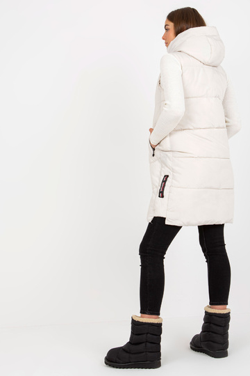 Ilga kreminė liemenė su... 2