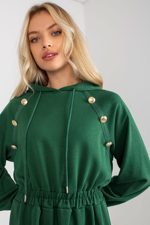 Tamsiai žalia midi platėjanti...