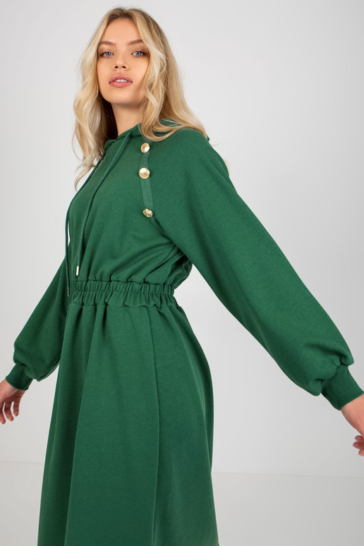 Tamsiai žalia midi platėjanti...