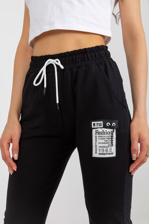 Juodos moteriškos sportinės kelnės