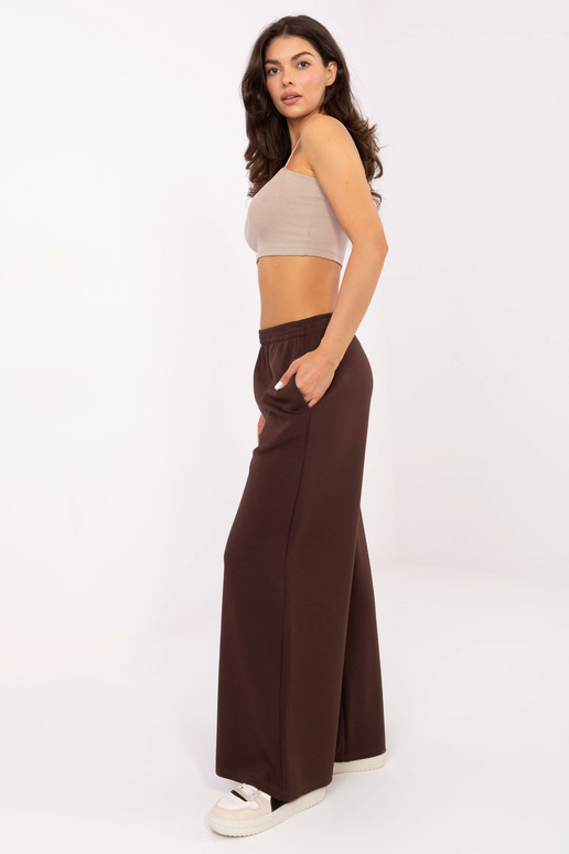 Tamsiai rudos kelnės