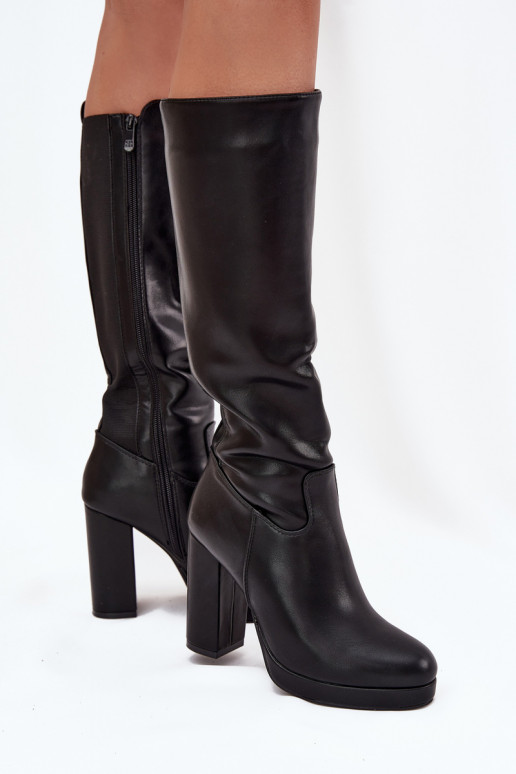 Moteriški ilgaauliai batai iki kelių su kulniukais, eko odos, juodos spalvos Thalina Moteriški ilgaauliai batai iki kelių su kulniukais, eko odos, juodos spalvos Thalina