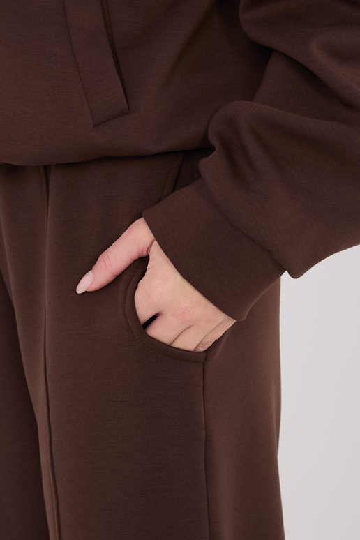 Kelnės tamsiai rudos spalvos