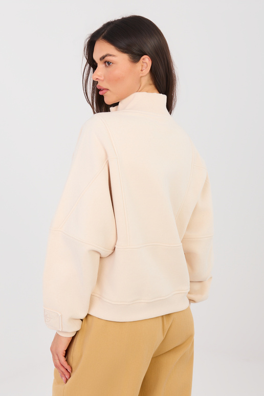 Mėlyna bliuzonė šviesiai smėlio spalvos