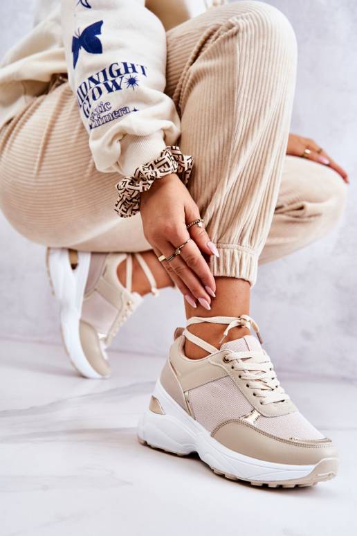 Blizgantys sportiniai bateliai su... Blizgantys sportiniai bateliai su...